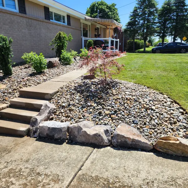 Corner bed with boulders